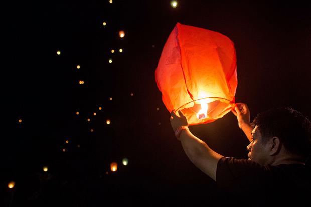 Lighting lanterns before the anniversary | Photo grabbed from thetimes.co.uk