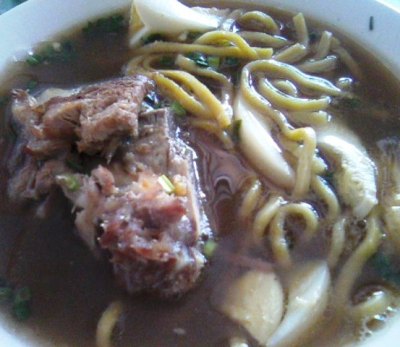 Mami with pork and sliced hard boiled egg